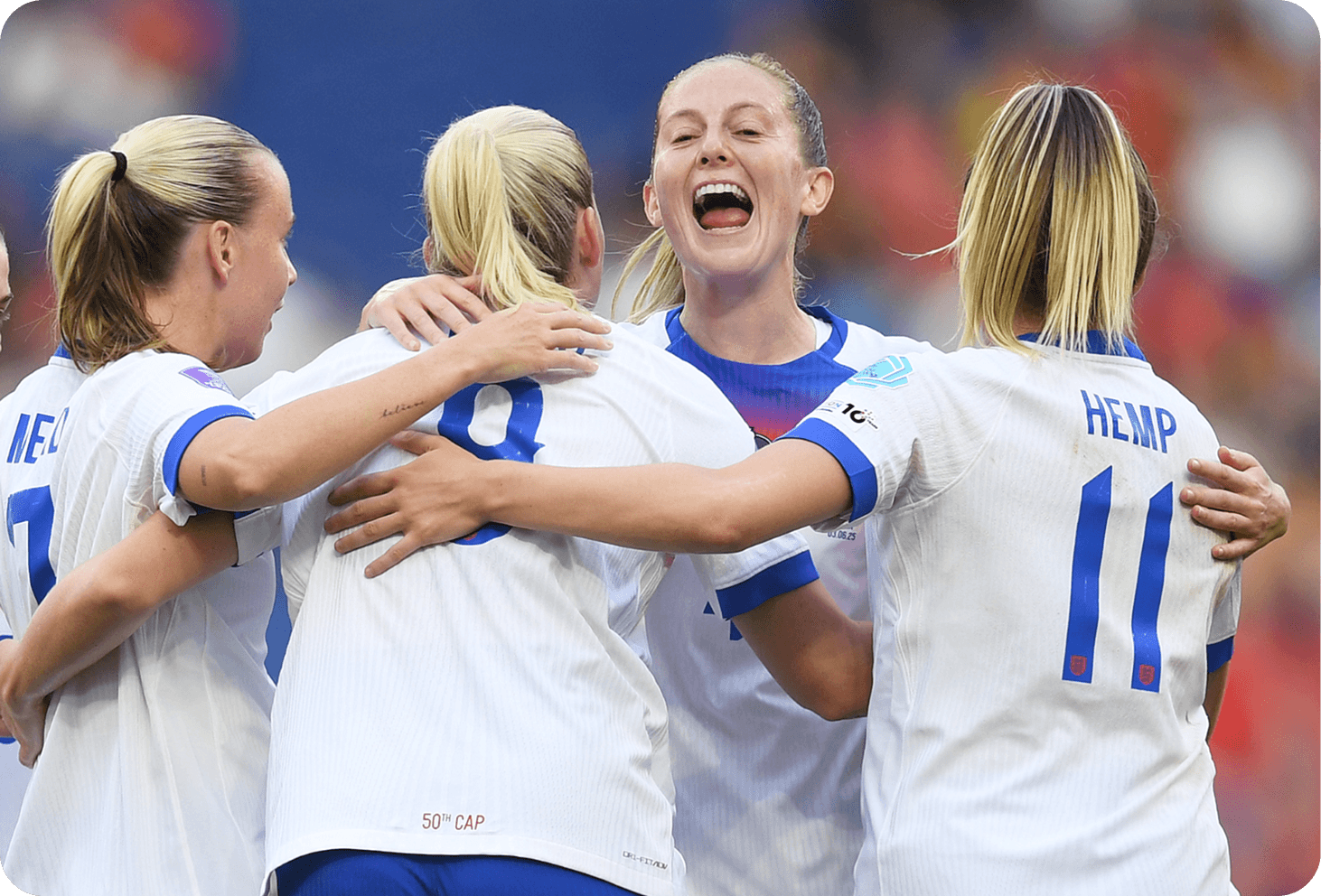 Football players embracing